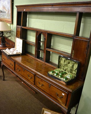 Lot 1296 - An 18th/19th century oak dresser with associated rack