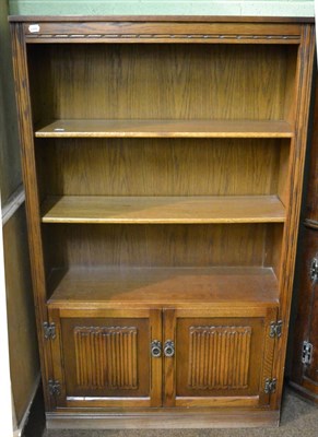 Lot 1307 - A 1920's oak bookcase