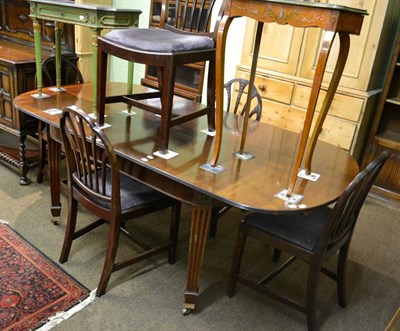 Lot 1314 - A mahogany extending dining table