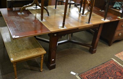 Lot 1324 - A mahogany draw leaf dining table with blind fret carved square section legs