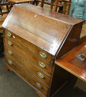 Lot 1326 - George III oak bureau