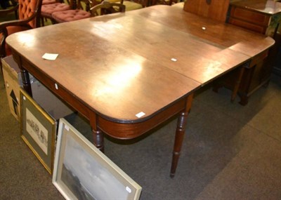 Lot 1347 - A 19th century gate leg dining table fitted with an additional leaf