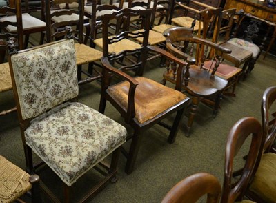 Lot 1358 - A George III mahogany dining chair together with a later carved oak chair (2)