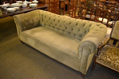 Lot 1365 - A Victorian button back Chesterfield style sofa upholstered in olive green