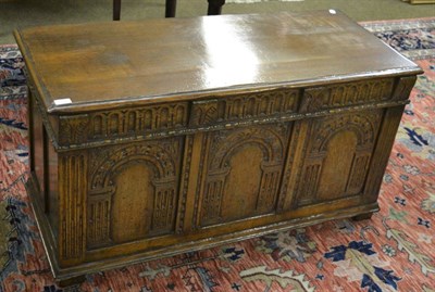 Lot 1373 - A 1920's carved oak blanket box