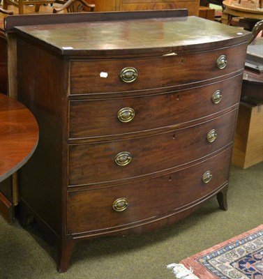 Lot 1379 - A George III mahogany bow fronted four height chest of drawers