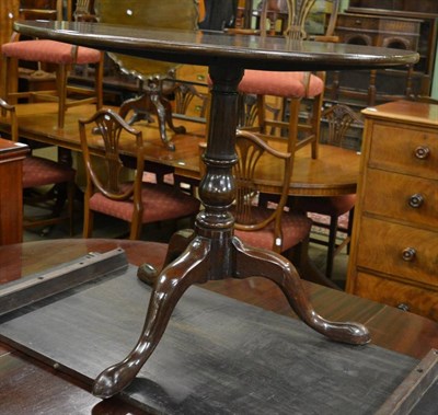 Lot 1380 - A 19th century mahogany tilt top tripod table