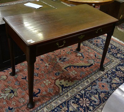 Lot 1382 - A 18th century mahogany side table on pad feet