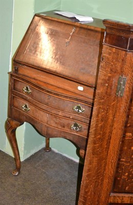 Lot 1401 - A walnut bureau