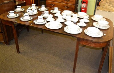 Lot 1411 - George III mahogany D-end dining table fitted with two additional leaves