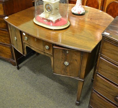 Lot 1413 - A George III mahogany bow fronted sideboard of small proportions