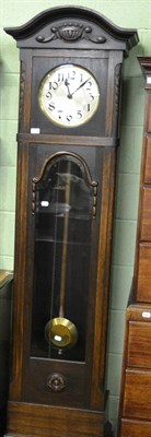 Lot 1420 - An oak veneered chiming long case clock with a triple weight drive movement, circa 1920