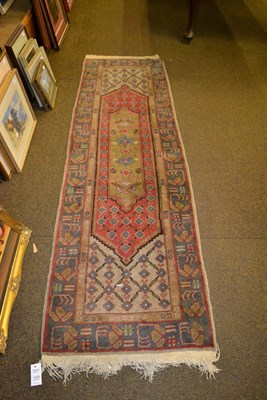 Lot 1428 - A narrow Sarab design runner, the strawberry lozenge field framed by spandrels and floral...