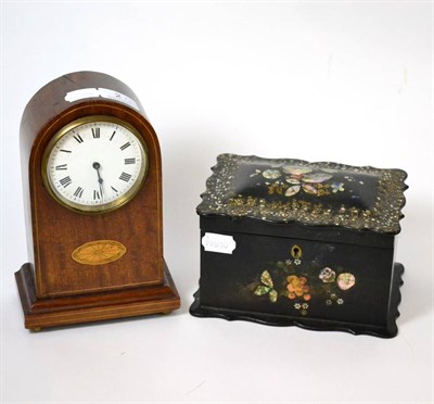 Lot 2 - A papier mache black painted and mother-of-pearl inlaid tea caddy and an Edwardian mantel clock (2)