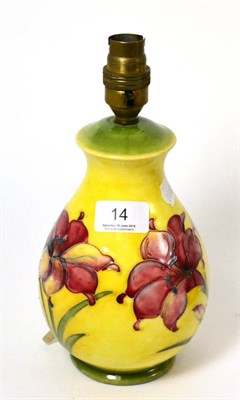 Lot 14 - Moorcroft freesia pottery table lamp on yellow ground