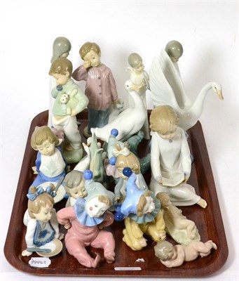 Lot 41 - Two Lladro figures of sleeping cherubs and a quantity of assorted Nao figures