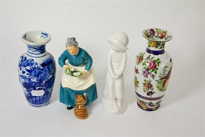 Lot 44 - A Royal Doulton pottery figure ";The Favourite";, HN2249, two ceramic vases and a white glazed...