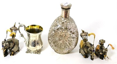 Lot 53 - Dimpled glass decanter and stopper with Chinese silver floral mount, three carved ebony...