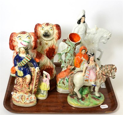 Lot 59 - A pair of seated Staffordshire dogs and five Staffordshire figural groups