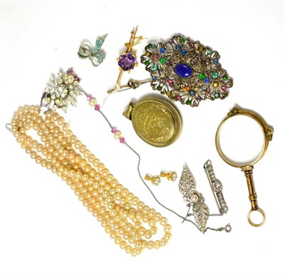 Lot 67 - An amethyst brooch stamped '9CT', a bar brooch, assorted costume jewellery including paste...