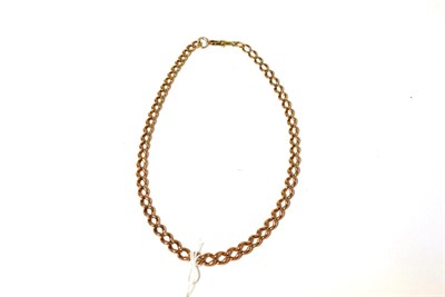 Lot 73 - A rose coloured Albert chain (worn)