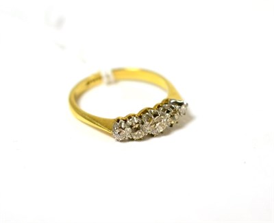 Lot 75 - A diamond five stone ring