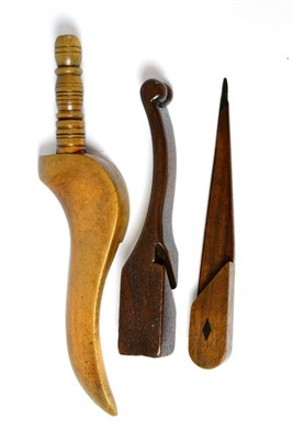 Lot 82 - Peg shaped knitting stick, another of elongated form inlaid with a diamond and a gullwing stick (3)