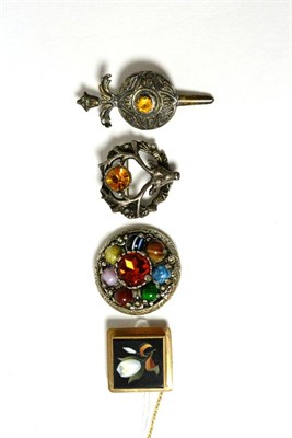 Lot 92 - Three Scottish brooches and a pietra dura brooch (4)