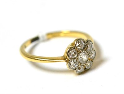 Lot 101 - A diamond eight stone cluster ring