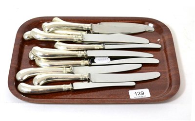 Lot 129 - A set of six modern silver pistol grip table and six side knives, Sheffield, 1973