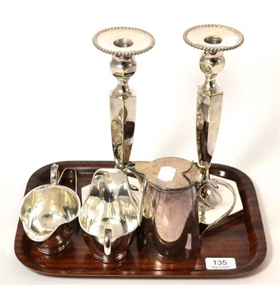 Lot 135 - A pair of plated table candlesticks and a small quantity of other plated wares