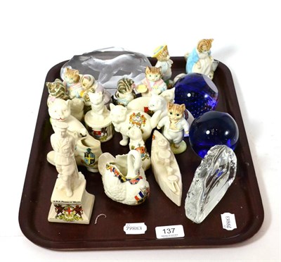 Lot 137 - Eight Beatrix Potter figures, souvenir china, Mats Jonasson glass paperweight, another with...