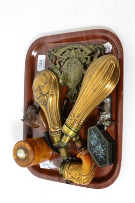 Lot 144 - Two copper shot flasks, two carved pipes, fox corkscrew, armorial plaque etc