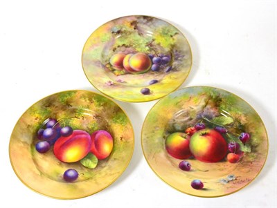 Lot 158 - Three Royal Worcester porcelain tea plates, painted by Lockyer, Austin and Townsend with fruit,...