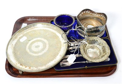 Lot 173 - A plated bottle coaster, silver pierced dishes, plated tray