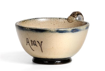 Lot 477 - A Martin Brothers Stoneware Cup, inscribed AMY, with a snake handle and blue glazed rim,...