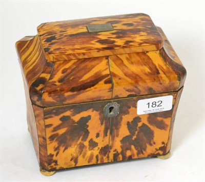 Lot 182 - A Regency walnut double division tea caddy and a silver caddy spoon