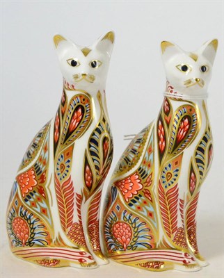 Lot 185 - Two Royal Crown Derby seated Siamese cats