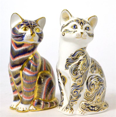 Lot 193 - Royal Crown Derby Majestic Cat paperweight and another decorated in the Imari colours (both...