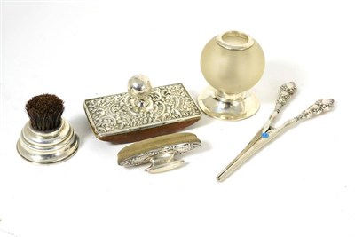 Lot 206 - Silver mounted blotter, silver handled glove stretchers, a nail buffer, silver mounted match strike