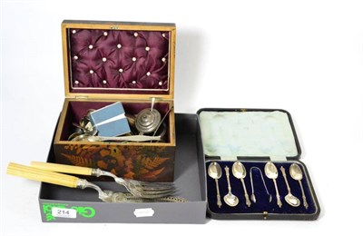 Lot 214 - A quantity of silver including teaspoons, salt with blue glass liner, two sugar tongs etc