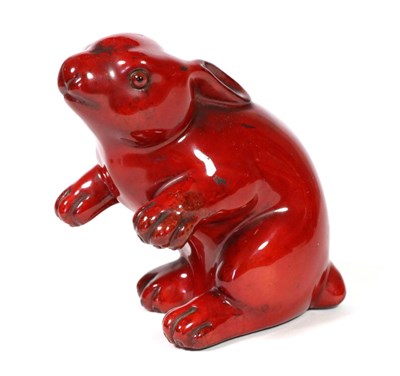 Lot 481 - Bernard Moore (1850-1935): A Porcelain Rabbit, modelled seated on its haunches, flambé glaze, with