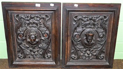 Lot 230 - A pair of carved oak panels