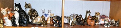 Lot 231 - Two Winstanley pottery cats, Babbacombe Devon pottery cats, cast cat doorstop and other cat figures