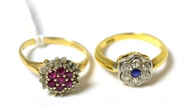 Lot 244 - A diamond and sapphire set ring stamped '18CT' and a ruby and diamond cluster ring