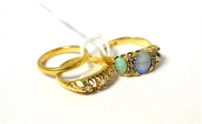 Lot 246 - An 18ct gold opal set ring (one opal missing) a band ring stamped '22CT' and a diamond set ring...