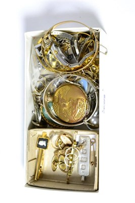 Lot 250 - A pair of 9ct gold cufflinks, two brooches stamped '9CT', three dress rings, silver ingot,...