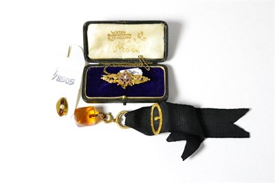 Lot 283 - A 9ct gold Victorian bar brooch (cased), pearl set stick pin and a fob on gilt metal chain