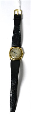 Lot 285 - A 9ct gold cushion shaped wristwatch, 1937, lever movement, silvered dial with Arabic numerals,...