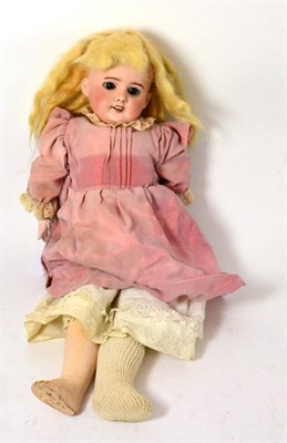 Lot 305 - SFBJ 60 bisque socket head doll, with sleeping eyes, on composition jointed body, wearing a...